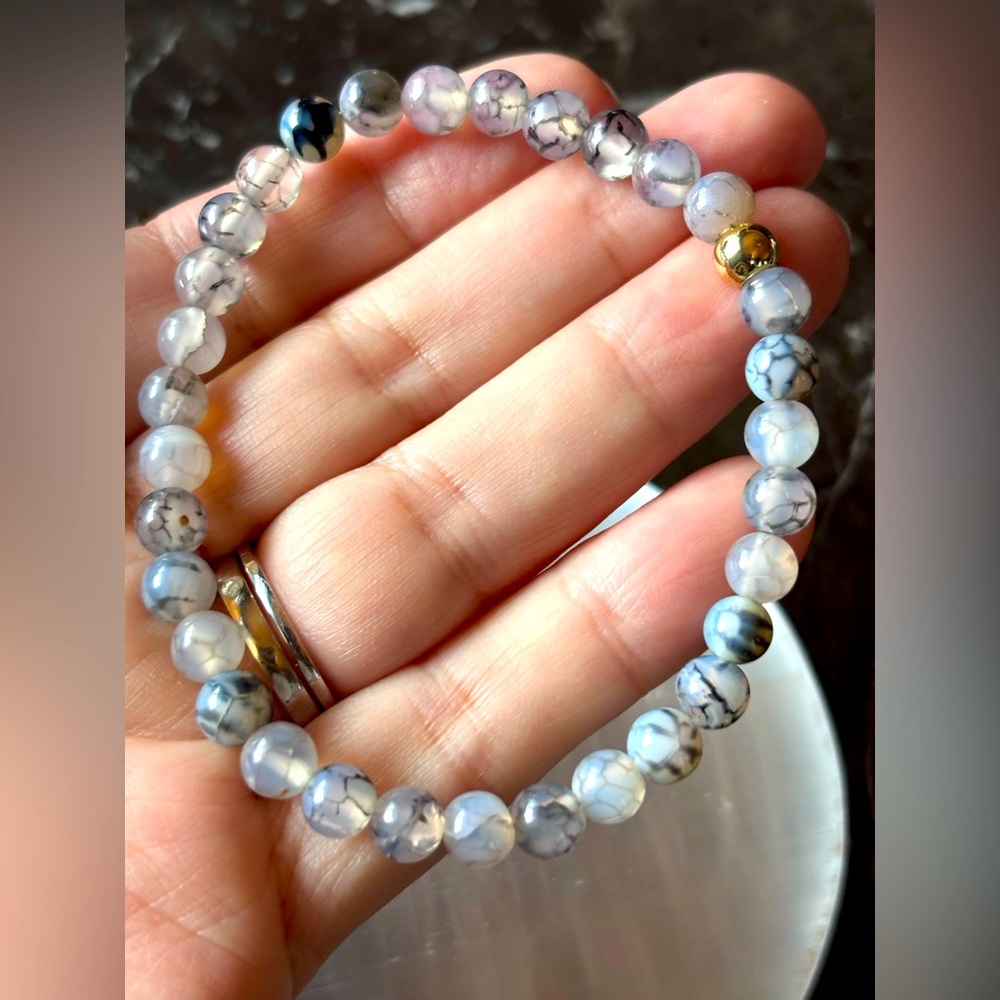 Stretch bracelet 
Size 7”
6mm bead size
Gold accent bead